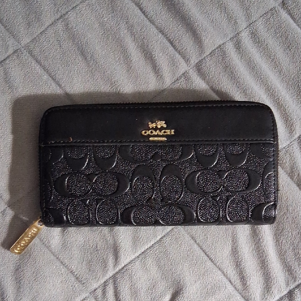 Coach Black Leather Wallet with Embossed Pattern